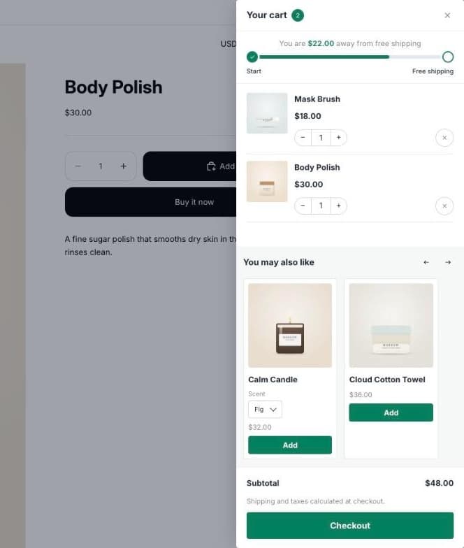 Cart drawer after adding Mask Brush from the suggestions: two items, $22.00 away from free shipping, subtotal $48.00, and new suggestions Calm Candle and Cloud Cotton Towel