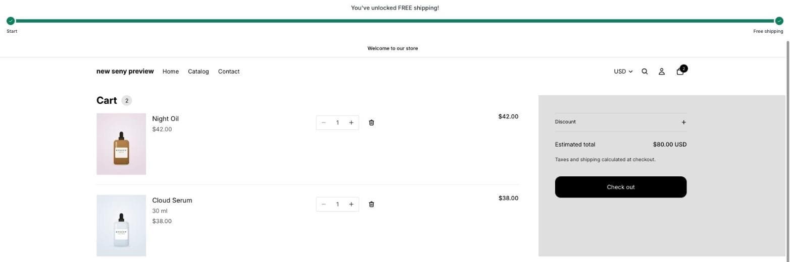 Shopify cart page with two products totalling $80 and the bar reading You’ve unlocked FREE shipping! with a full progress track