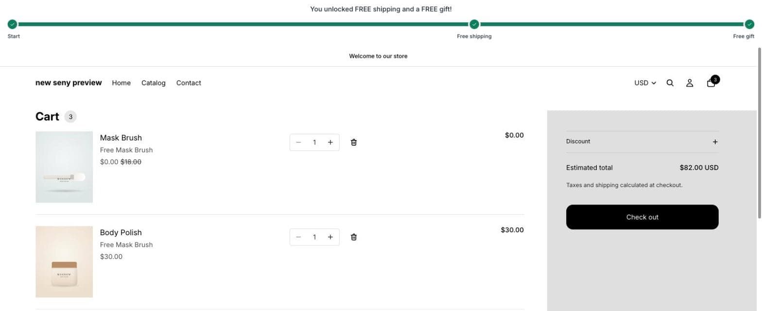 Shopify cart with the free Mask Brush at $0.00 instead of $18.00, Body Polish and the bar saying You unlocked FREE shipping and a FREE gift